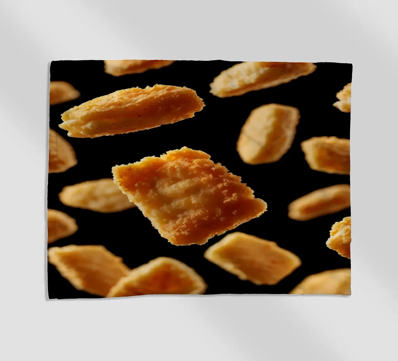 Nuggets in mid-air create a dynamic culinary display beach towel by DesignDoodle