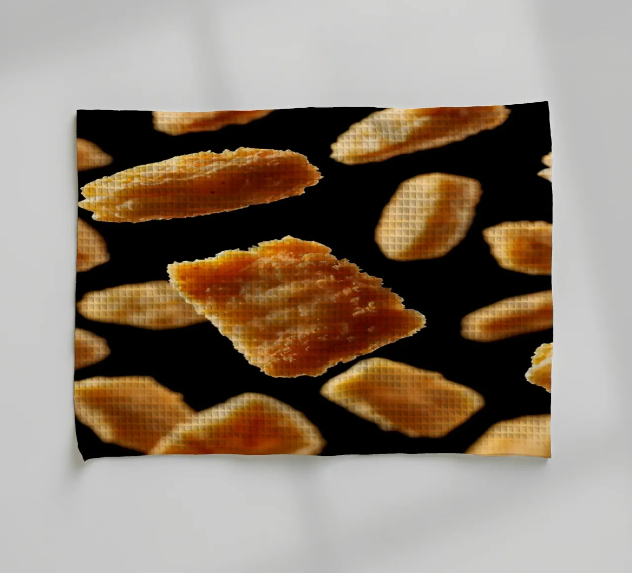 Nuggets in mid-air create a dynamic culinary display tea towel by DesignDoodle