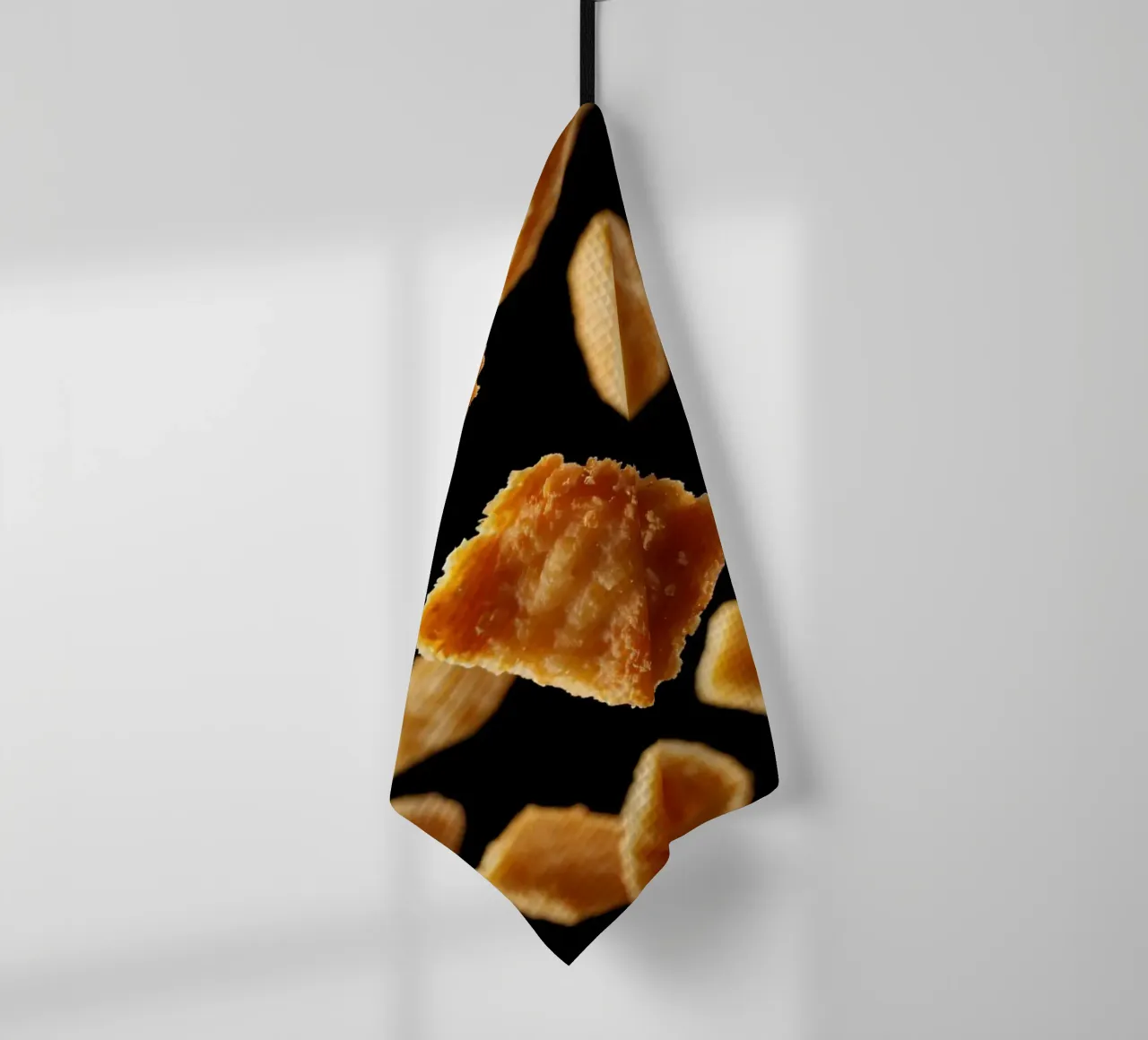 Nuggets in mid-air create a dynamic culinary display tea towel by DesignDoodle