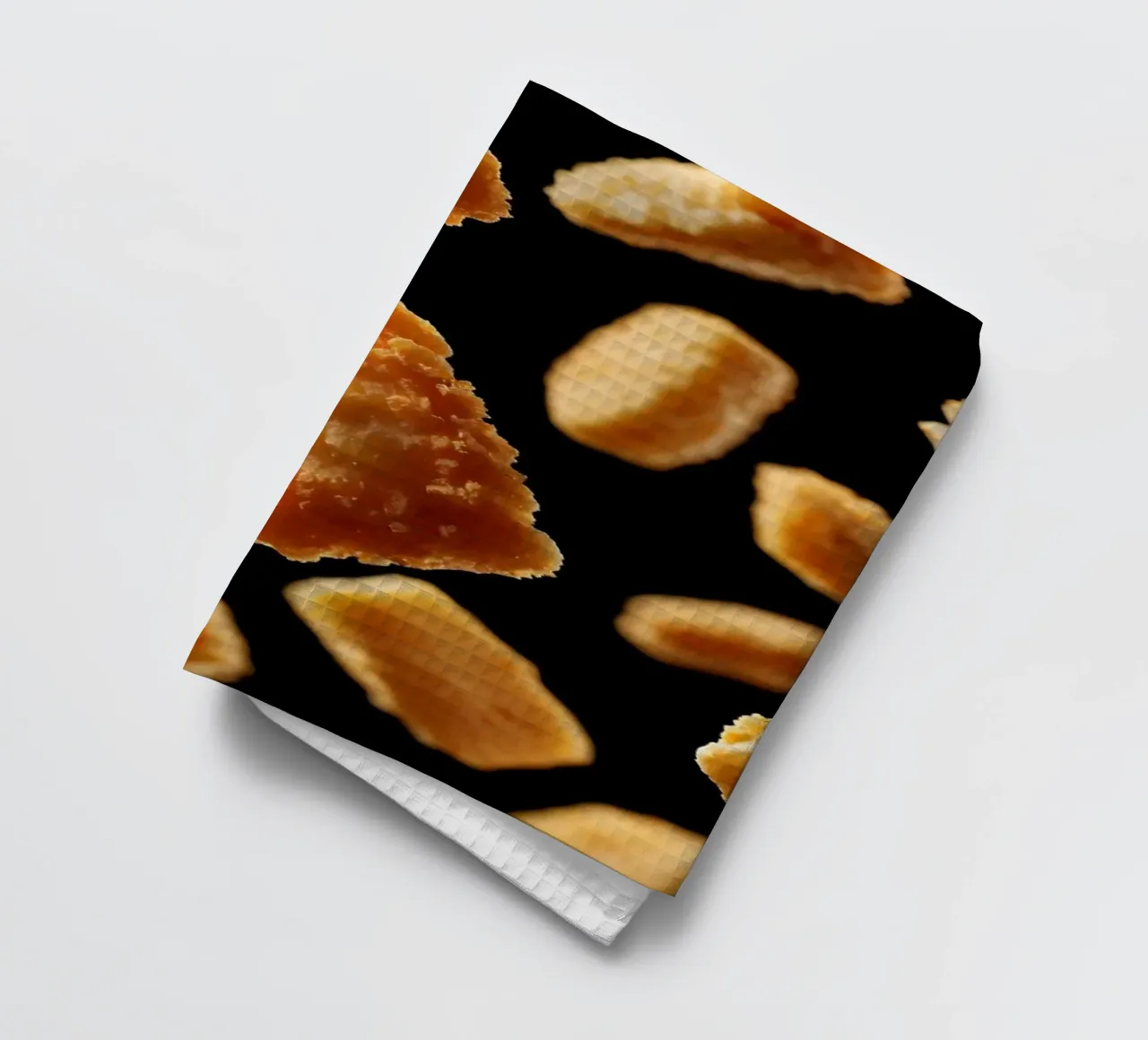 Nuggets in mid-air create a dynamic culinary display tea towel by DesignDoodle