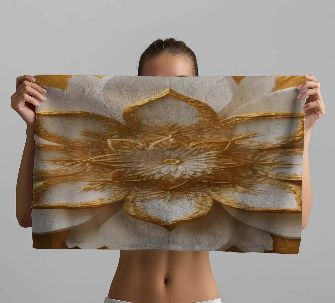 Decorative golden lotus flower design crafted on a textured towel by DesignDoodle