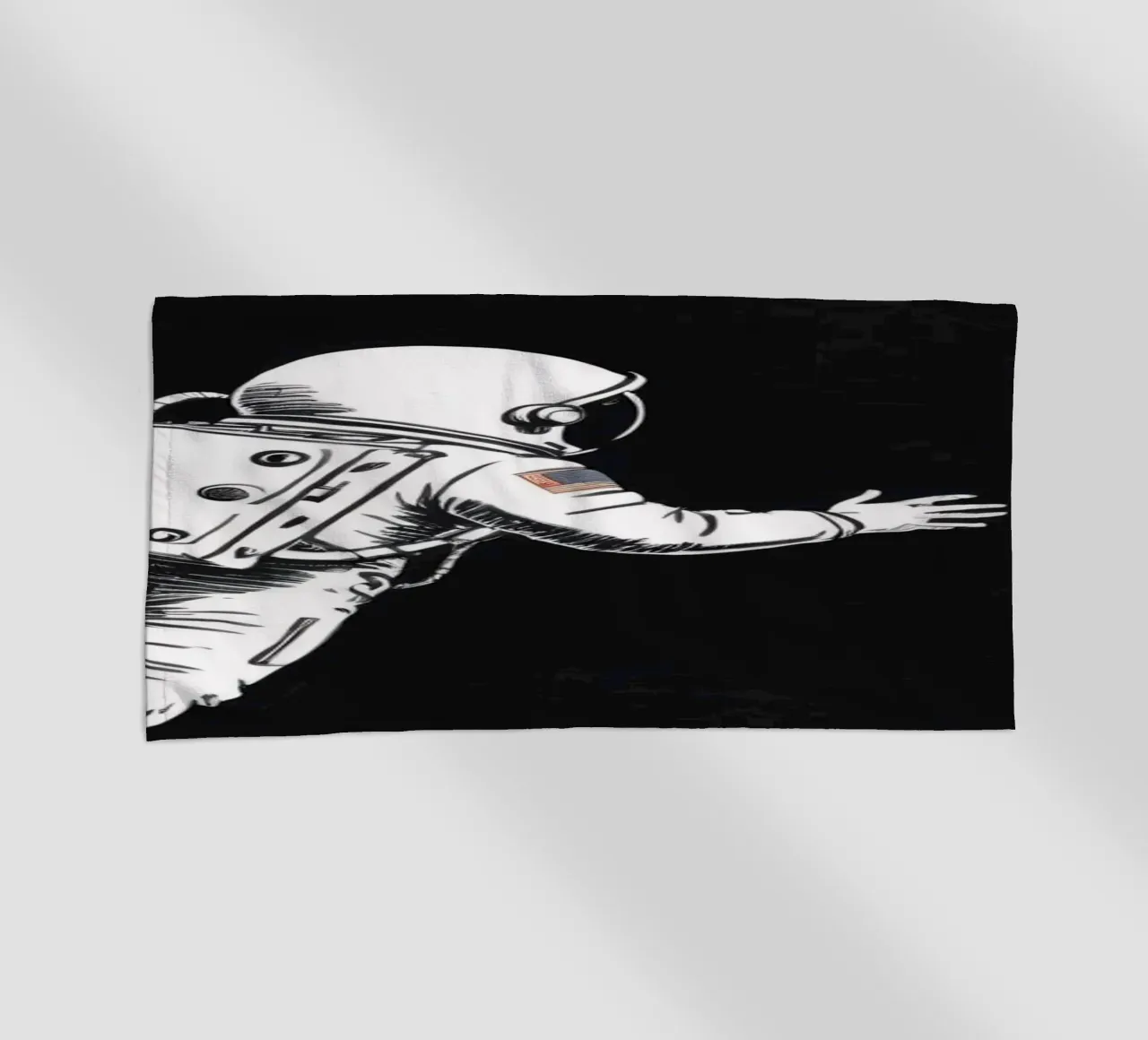 Astronaut floating towards the moon in a dark space beach towel by DesignDoodle