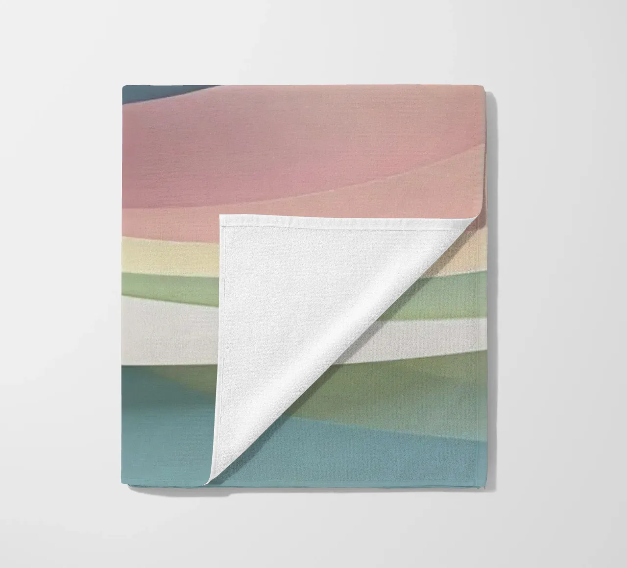 Swirling pastel patterns create a mesmerizing display beach towel by DesignDoodle