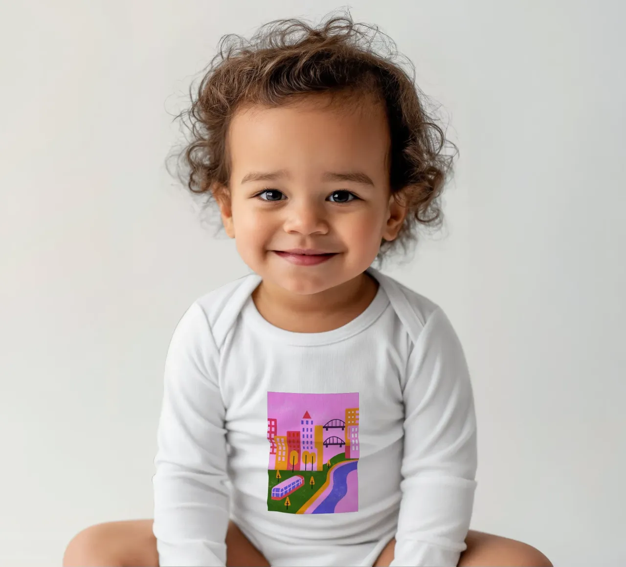 Retro Pop Cityscape long-sleeve baby romper by THE LATEST SHOP