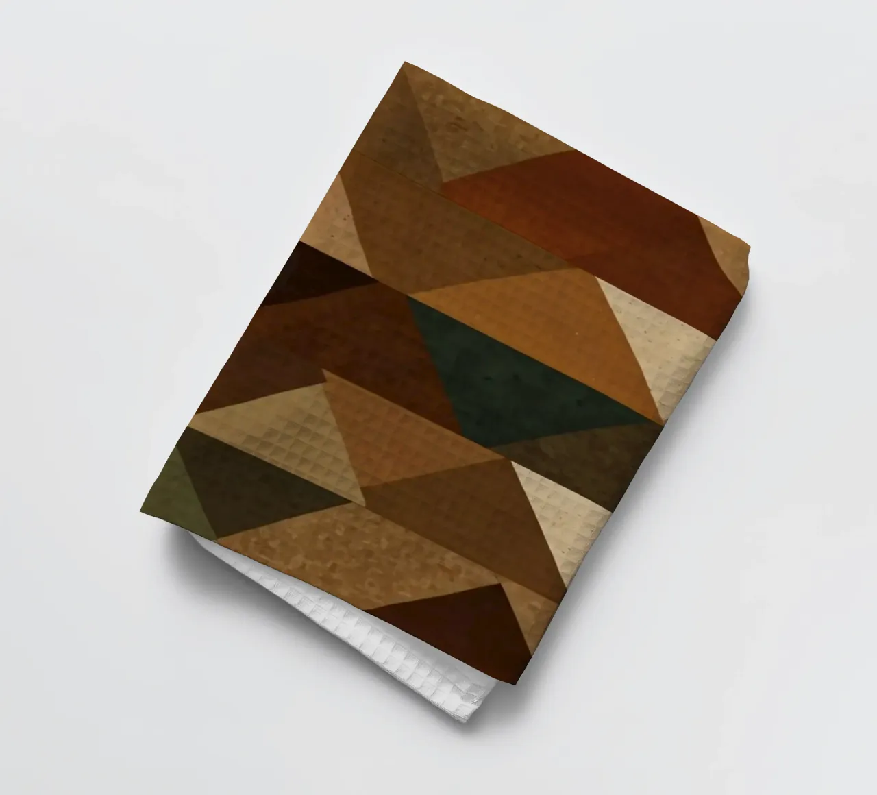 Un motif géométrique de triangles dans des tons terreux arrangés torchon de DesignDoodle