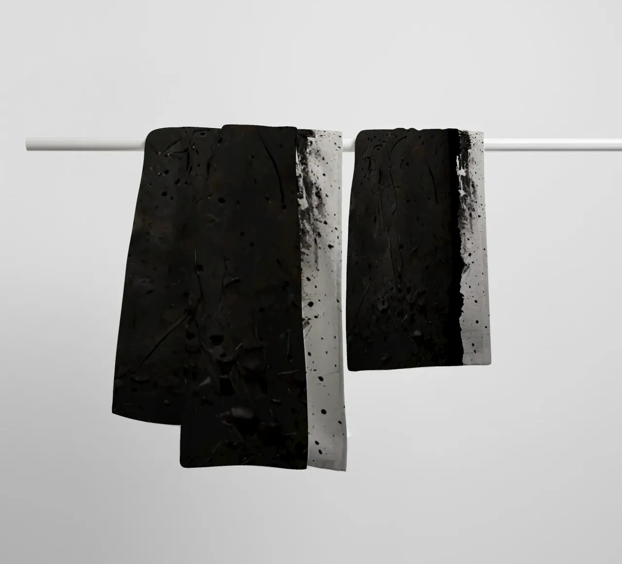 split in textured dark surfaces reveals an unexpected light towel by DesignDoodle