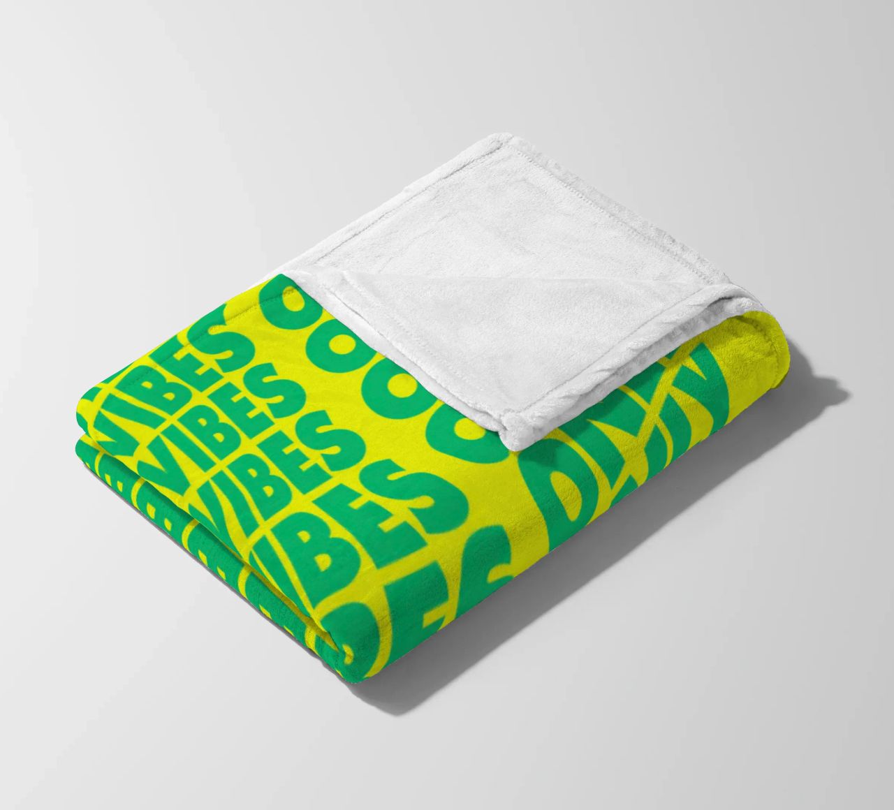 Good Vibes Only Typographie ondulée imprimée en vert et jaune plaid polaire de THE MOTIVATED TYPE