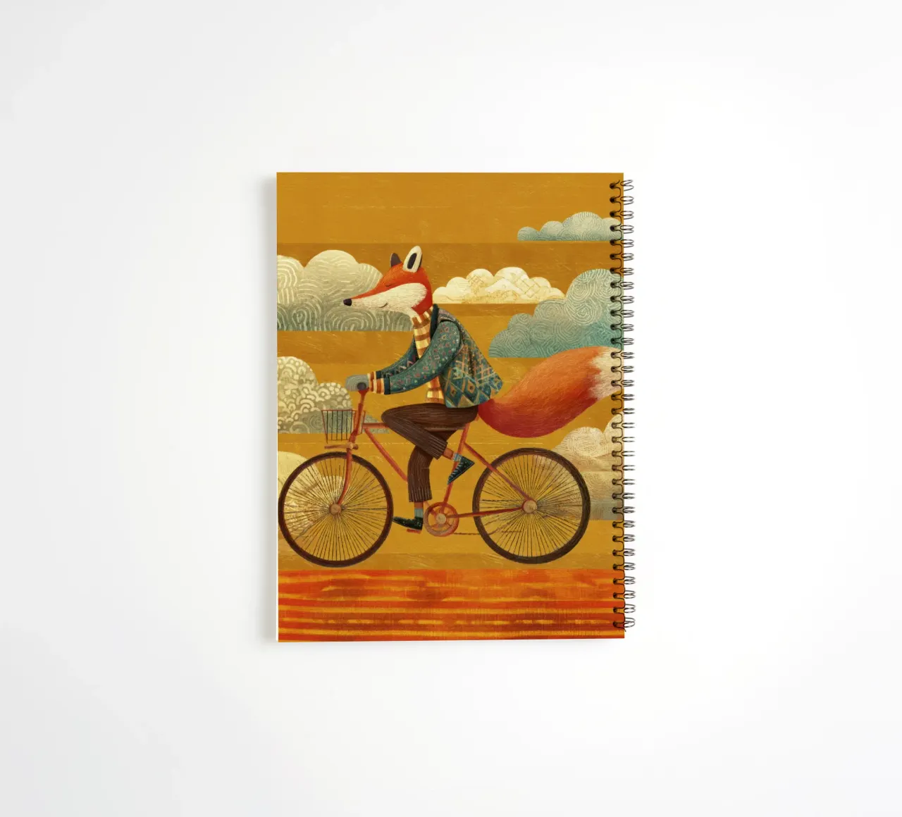 Whimsical Fox on Bike with Patterned Clouds and Orange Sky spiral notebook by Modern Muse