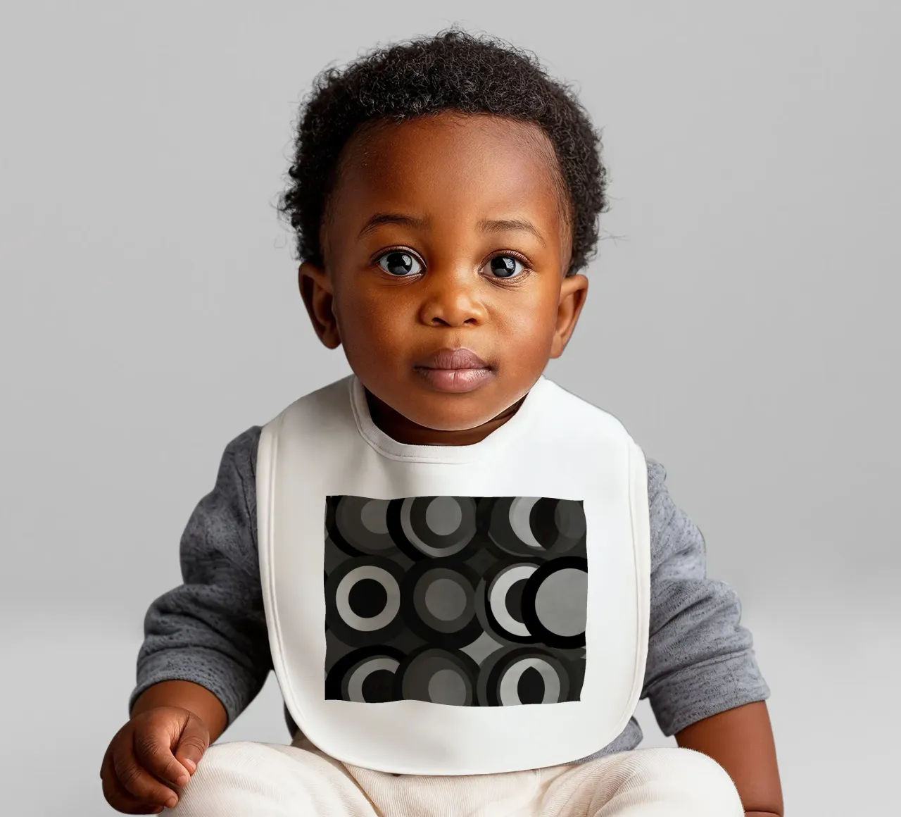 Abstract pattern of overlapping circles in various shades of baby bib by DesignDoodle