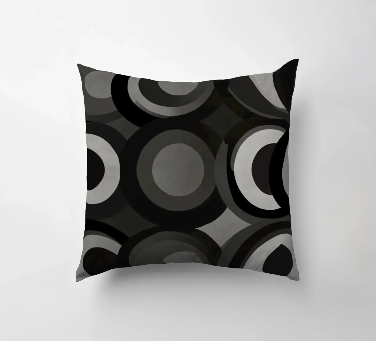 Abstract pattern of overlapping circles in various shades of decorative cushion by DesignDoodle