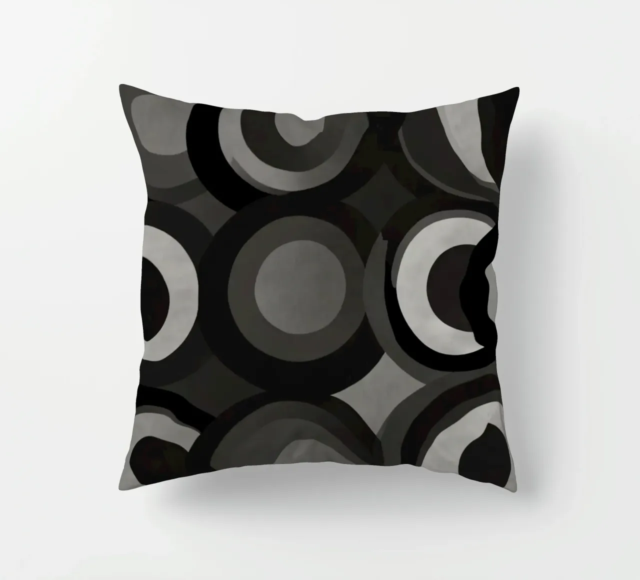 Abstract pattern of overlapping circles in various shades of decorative cushion by DesignDoodle