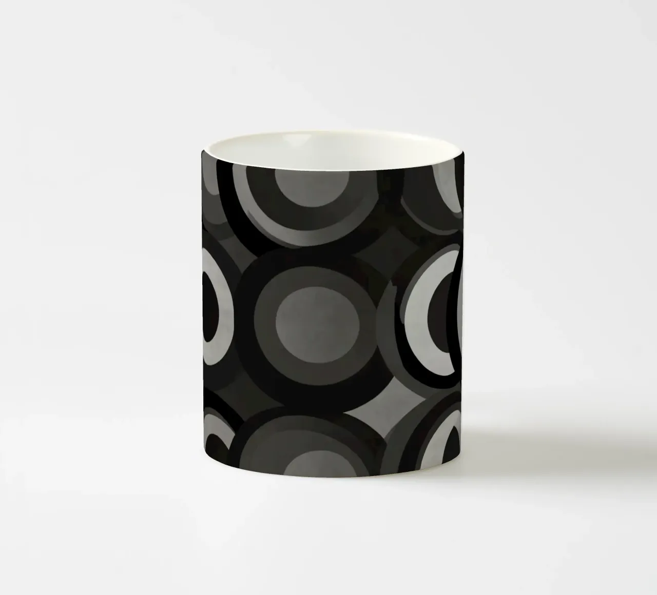 Abstract pattern of overlapping circles in various shades of ceramic mug by DesignDoodle
