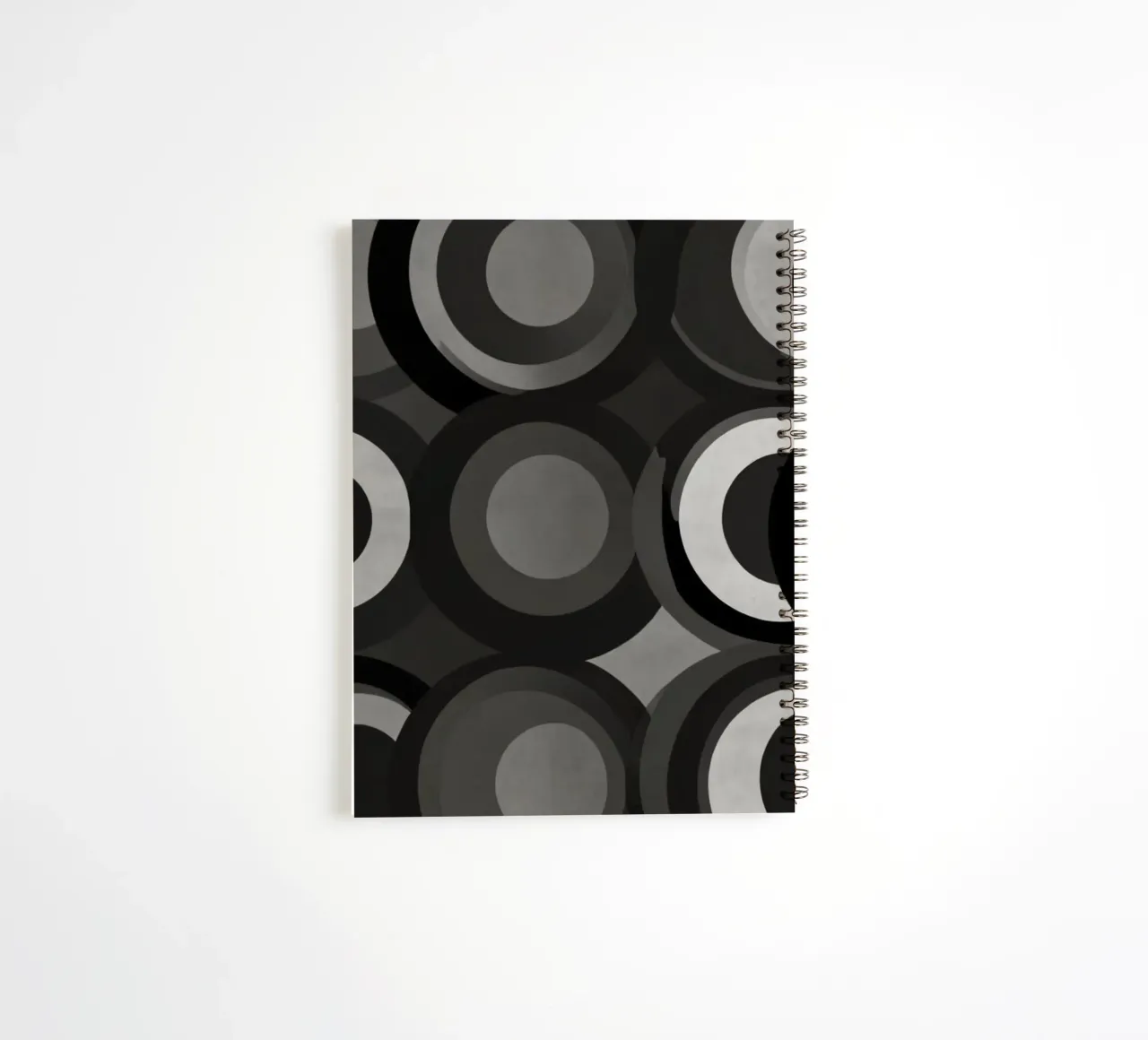 Abstraktes Muster aus sich überlappenden Kreisen in verschiedenen Farbtönen Ringbuch von DesignDoodle