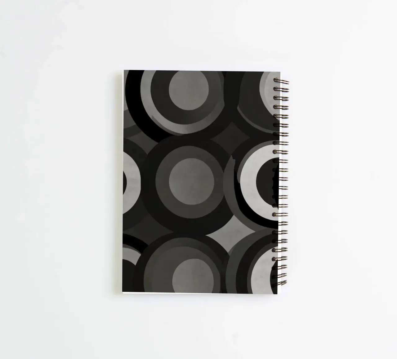 Abstraktes Muster aus sich überlappenden Kreisen in verschiedenen Farbtönen Ringbuch von DesignDoodle