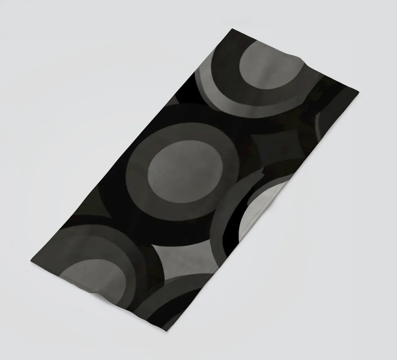 Abstract pattern of overlapping circles in various shades of beach towel by DesignDoodle