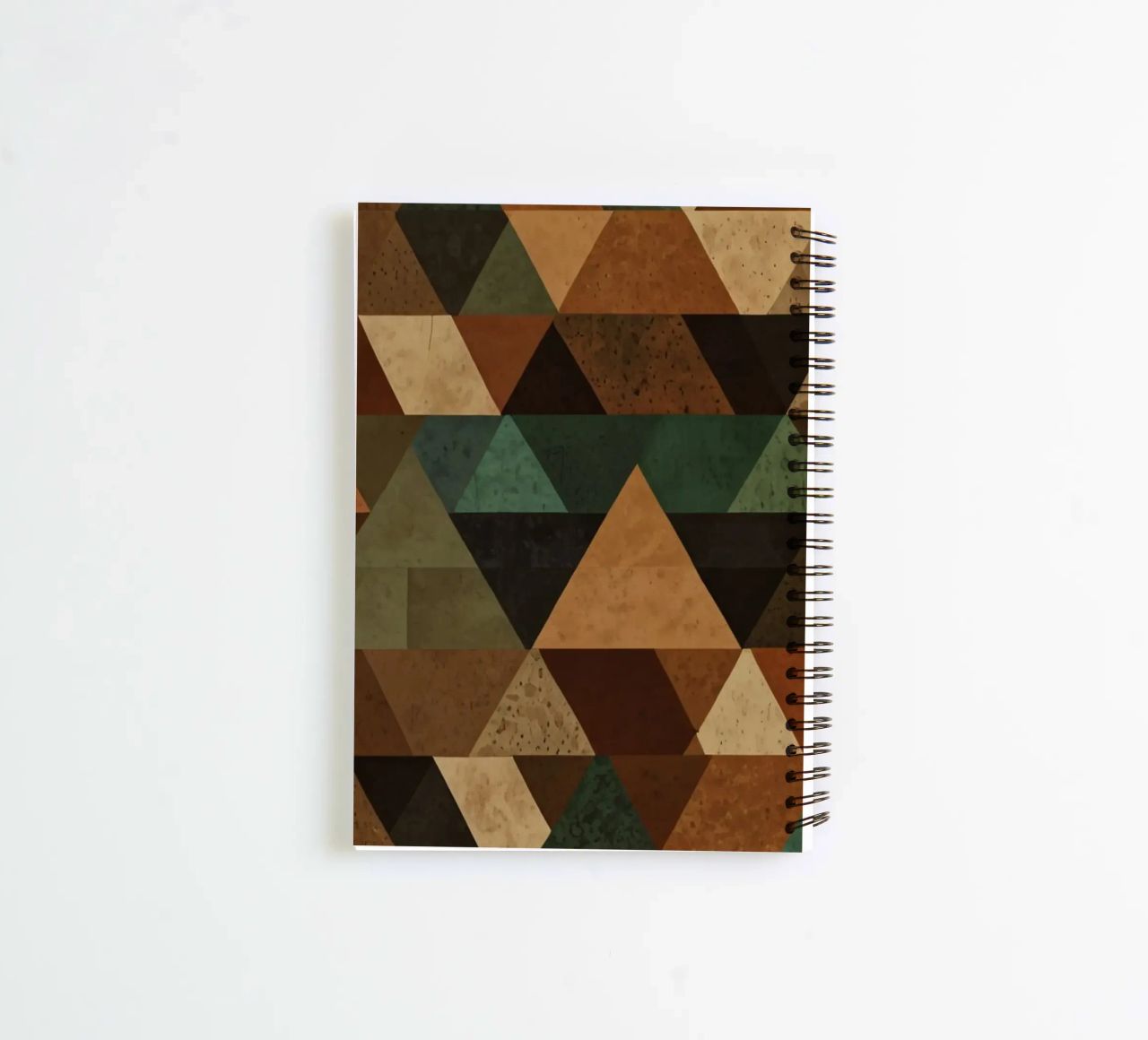 Colorful geometric pattern of alternating triangles in shade spiral notebook by DesignDoodle