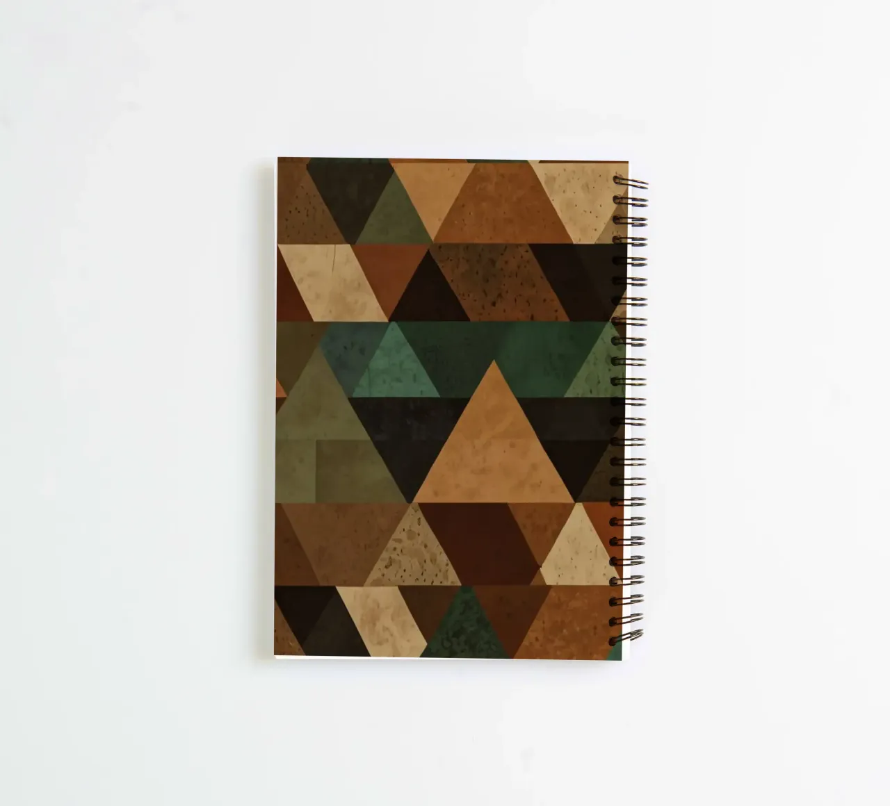 Motif géométrique coloré de triangles alternés dans l'ombre carnet à spirale de DesignDoodle