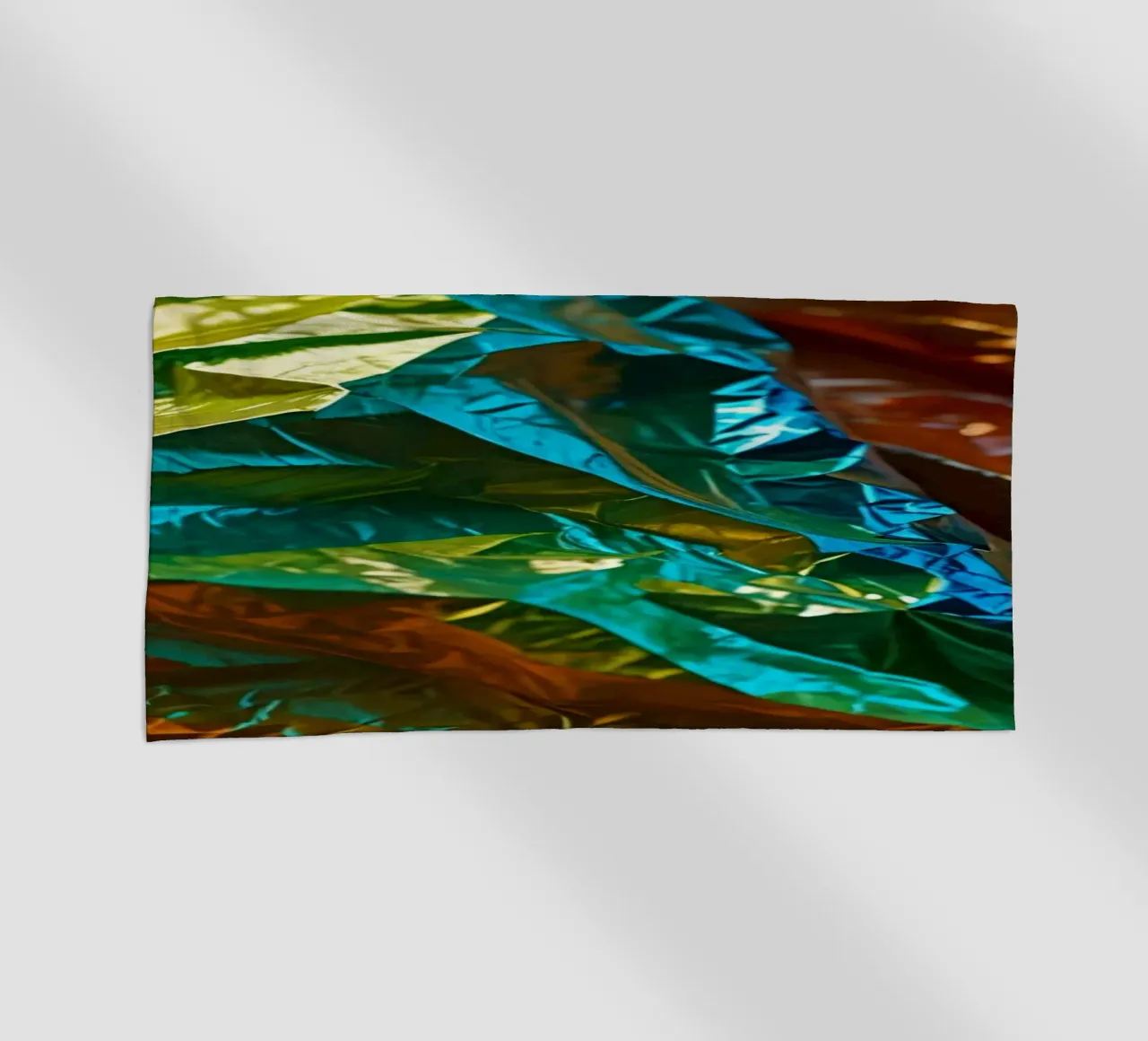 Colorful crumpled foil sheets create a vibrant texture beach towel by DesignDoodle