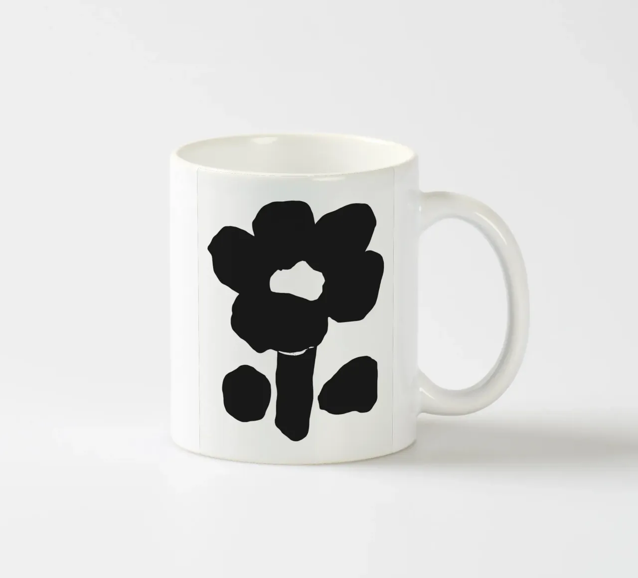 Silhouette floreale in grassetto tazza in ceramica da Little Dean