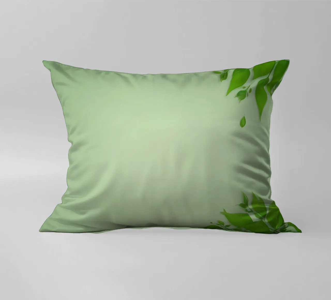 Green leaves on a soft background create a calming and fresh decorative cushion by DesignDoodle
