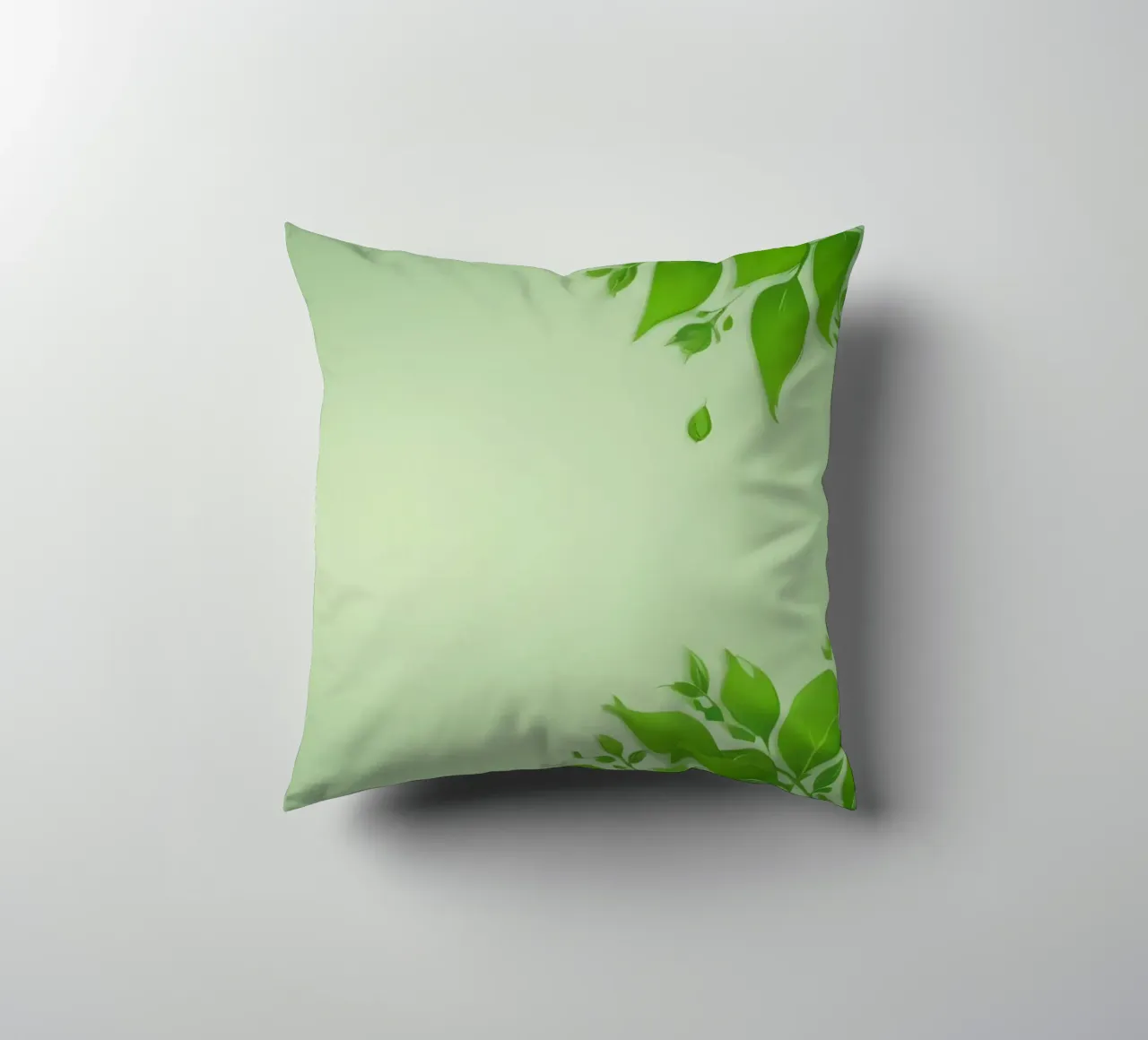 Green leaves on a soft background create a calming and fresh decorative cushion by DesignDoodle