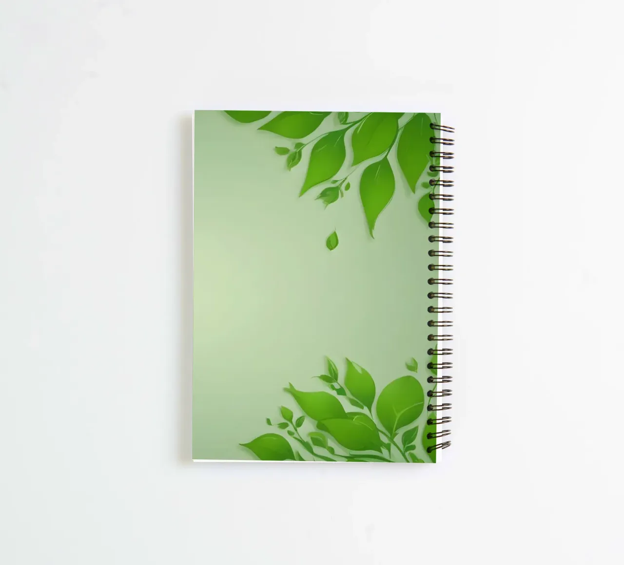 Green leaves on a soft background create a calming and fresh spiral notebook by DesignDoodle