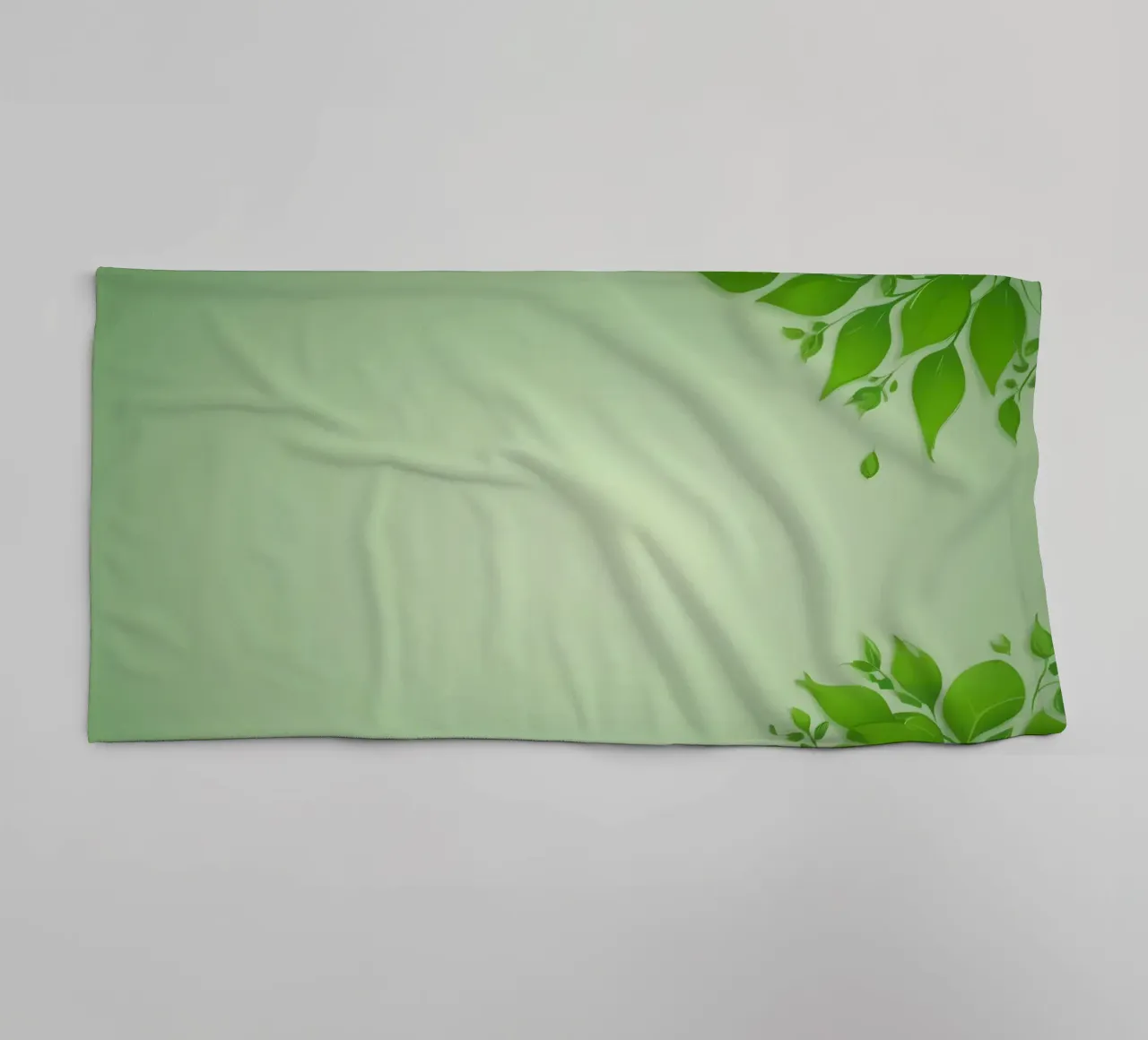 Green leaves on a soft background create a calming and fresh towel by DesignDoodle