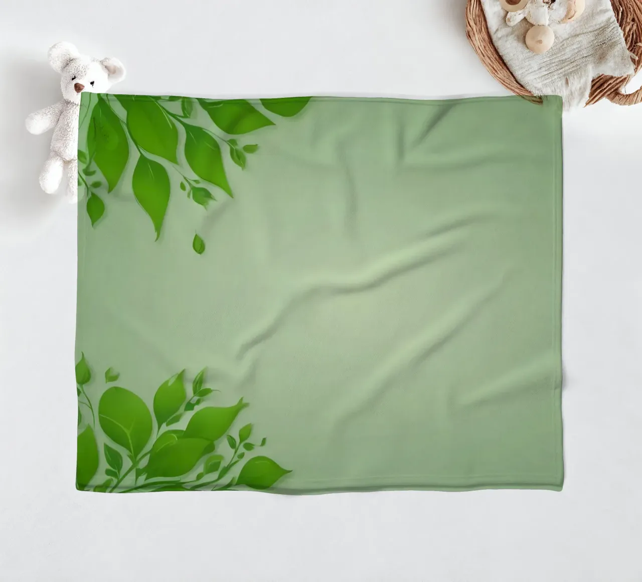 Green leaves on a soft background create a calming and fresh fleece blanket by DesignDoodle
