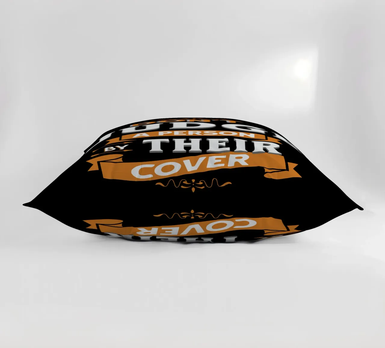 Don't Judge a Person by Their Cover decorative cushion by Gunawan Rb