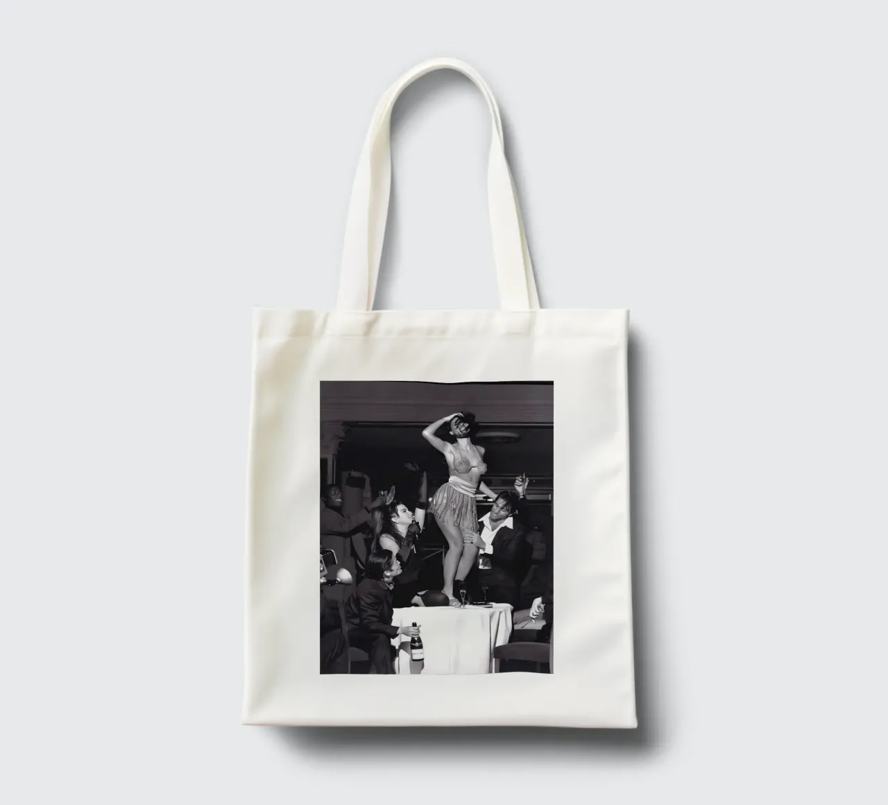 Woman dance on the table tote bag by Takeme