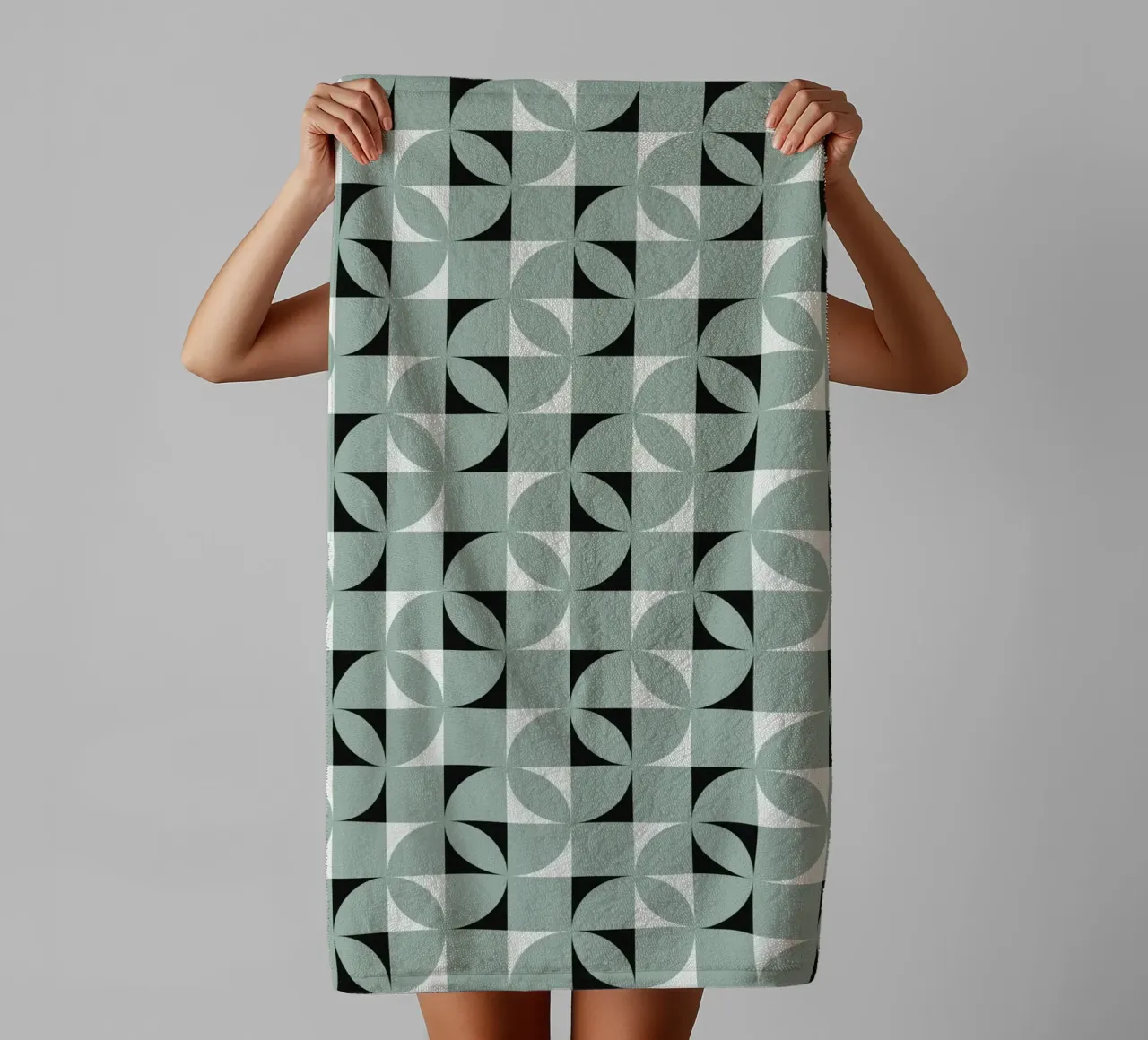 Green grid geometrical pattern towel by Little Dean