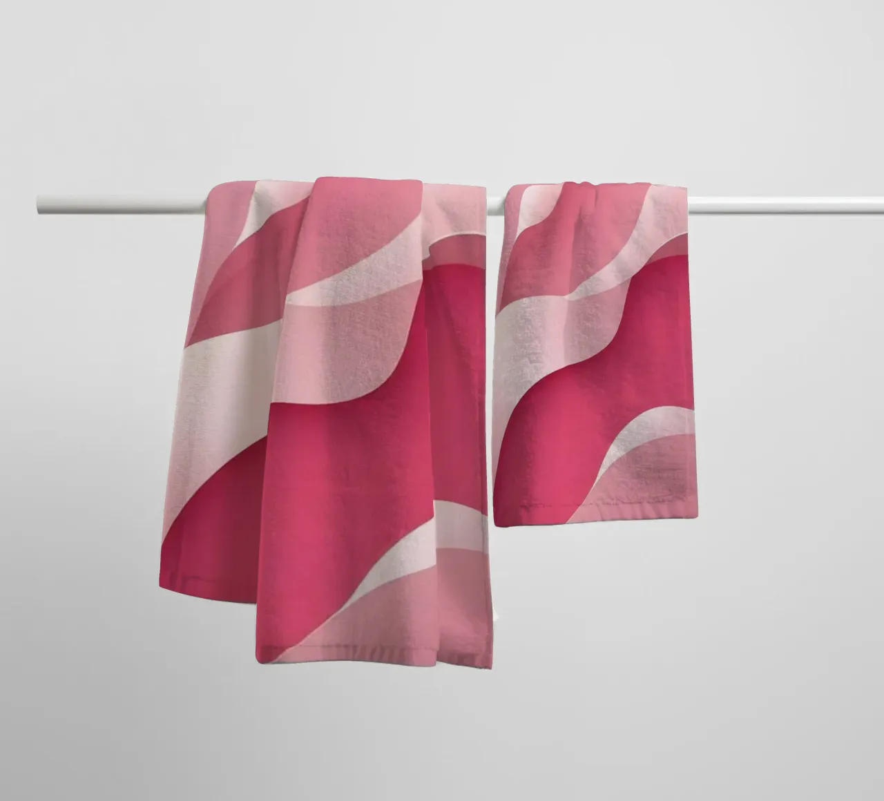 soft pink waves that create a gentle, flowing effect. towel by DesignDoodle