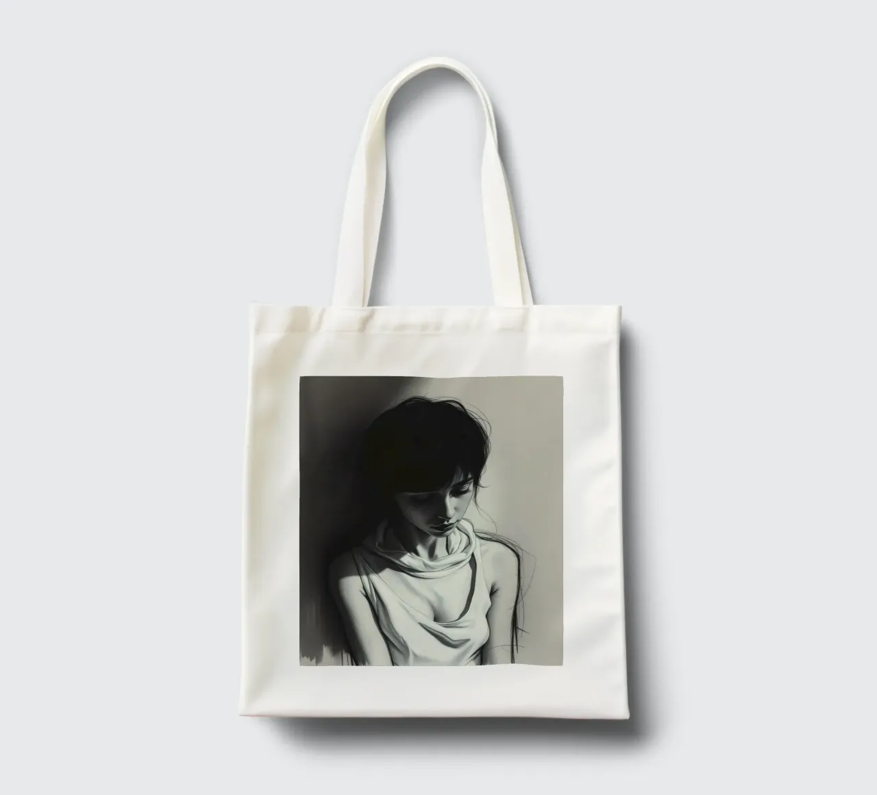 Jeune femme prenant une pose réfléchie sur un fond sombre tote bag de DesignDoodle