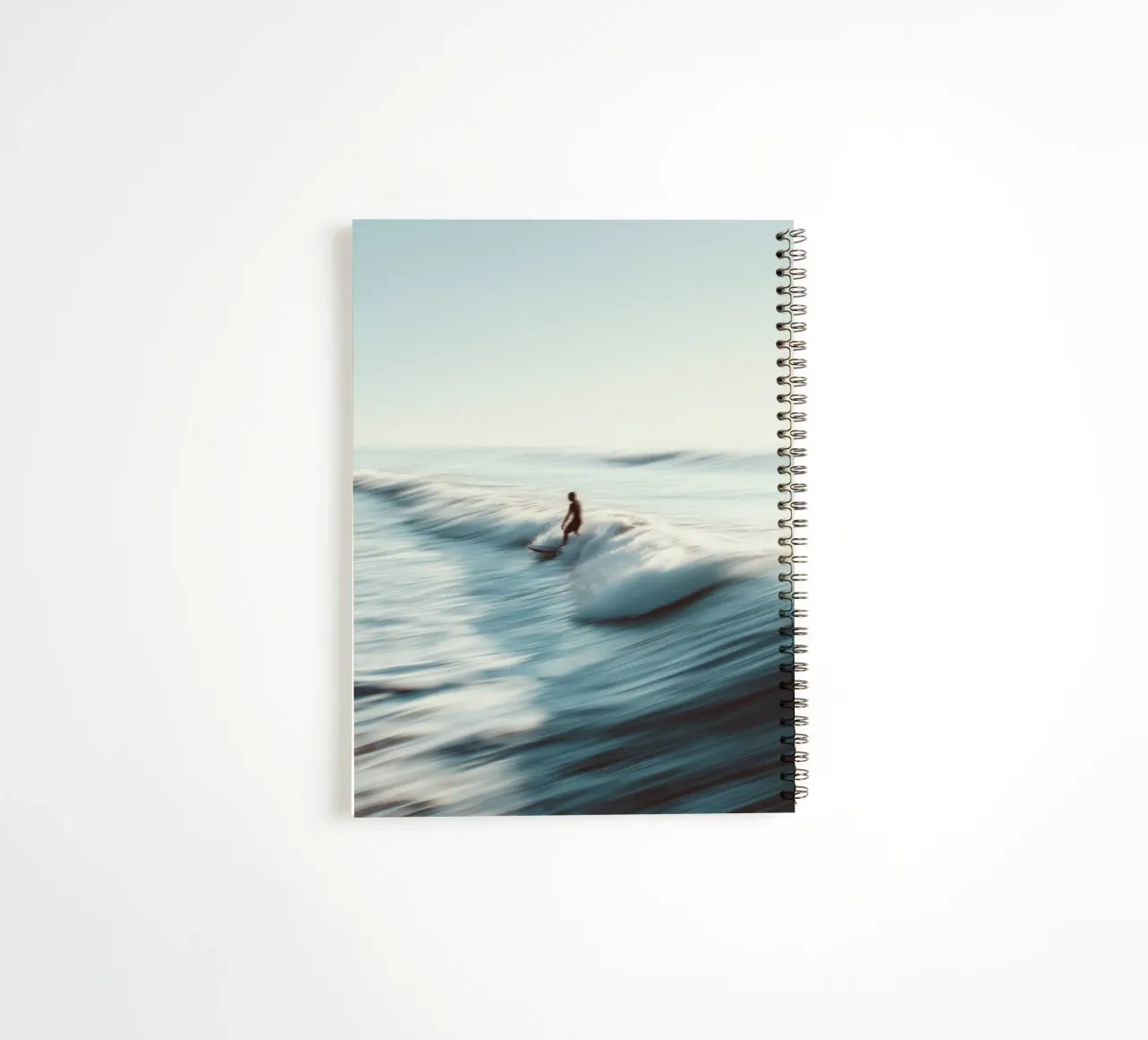 Surfer Riding Waves spiral notebook by Indigo Tides Art