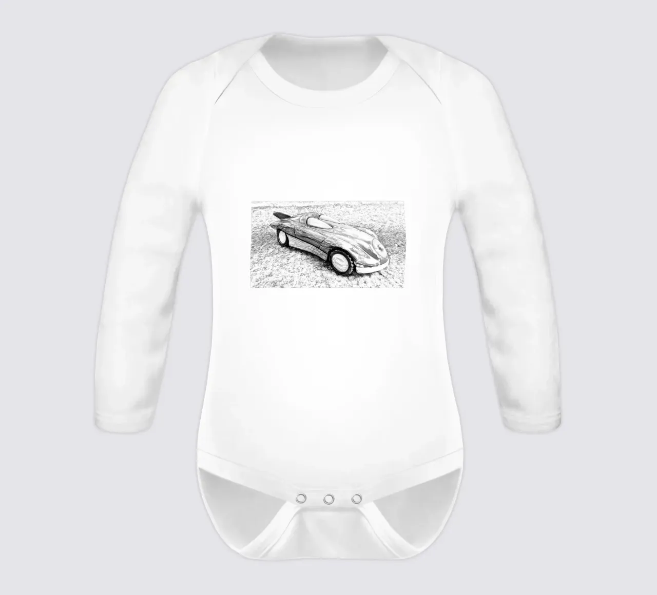 A car long-sleeve baby romper by Massimo Frascogna