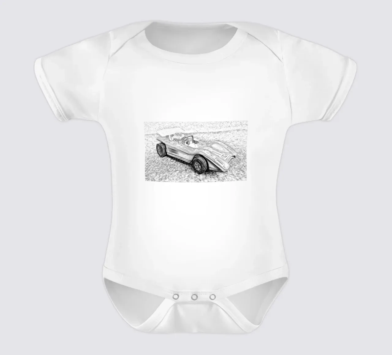 A car short-sleeve baby romper by Massimo Frascogna