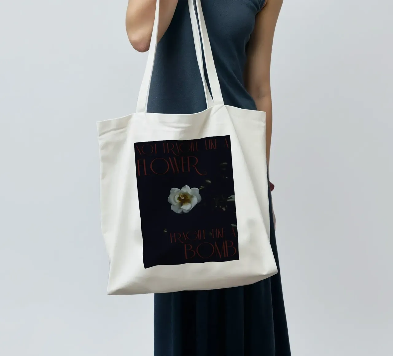 Not fragile like a flower, fragile like a bomb. borsa in juta da smallstage.photography