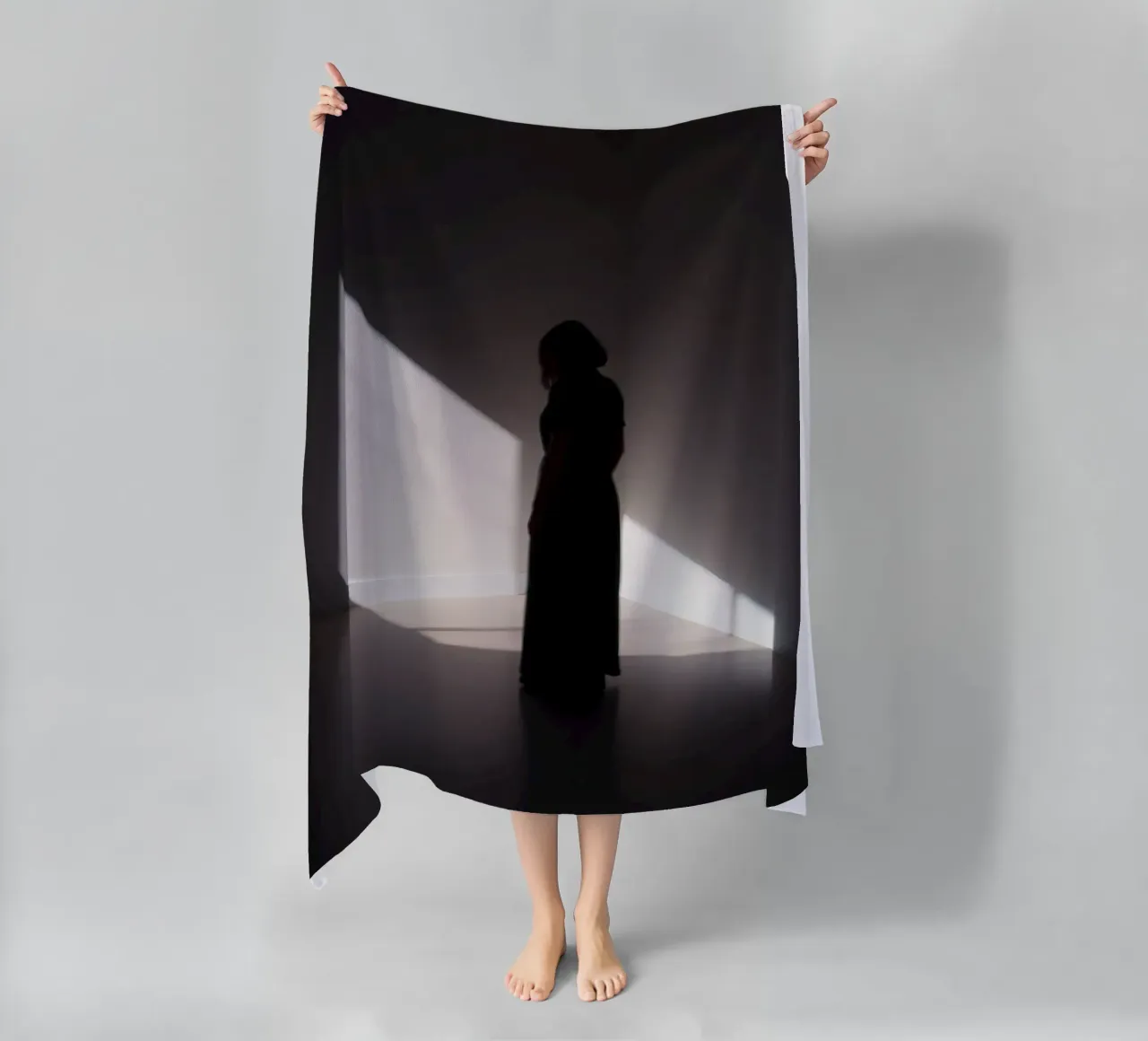Woman standing in shadow creepy light casting beach towel by DesignDoodle