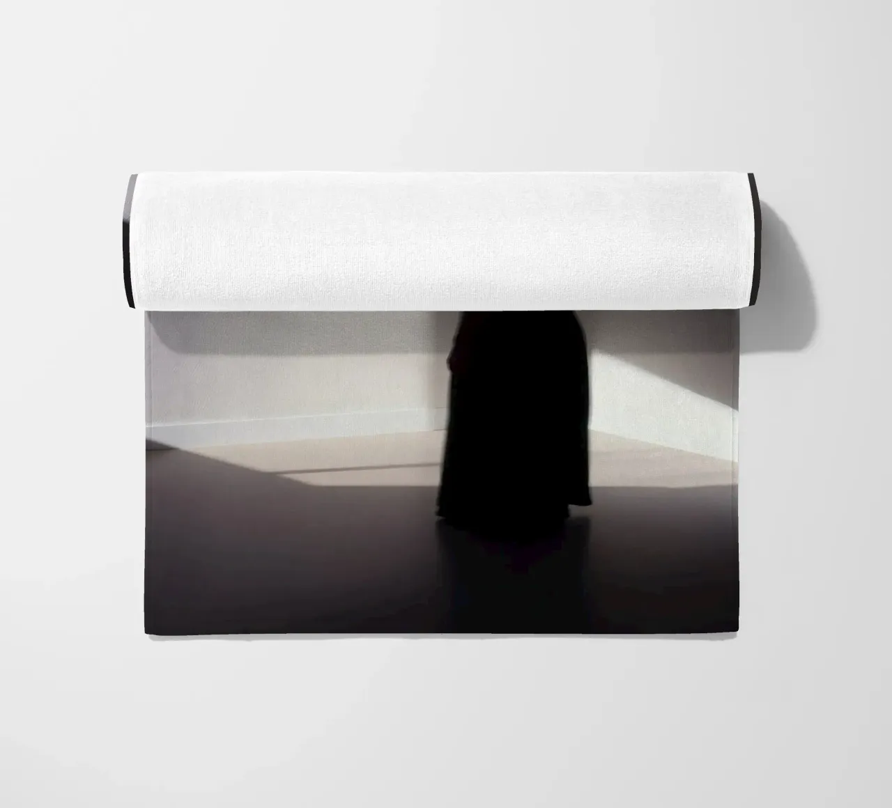 Woman standing in shadow creepy light casting beach towel by DesignDoodle