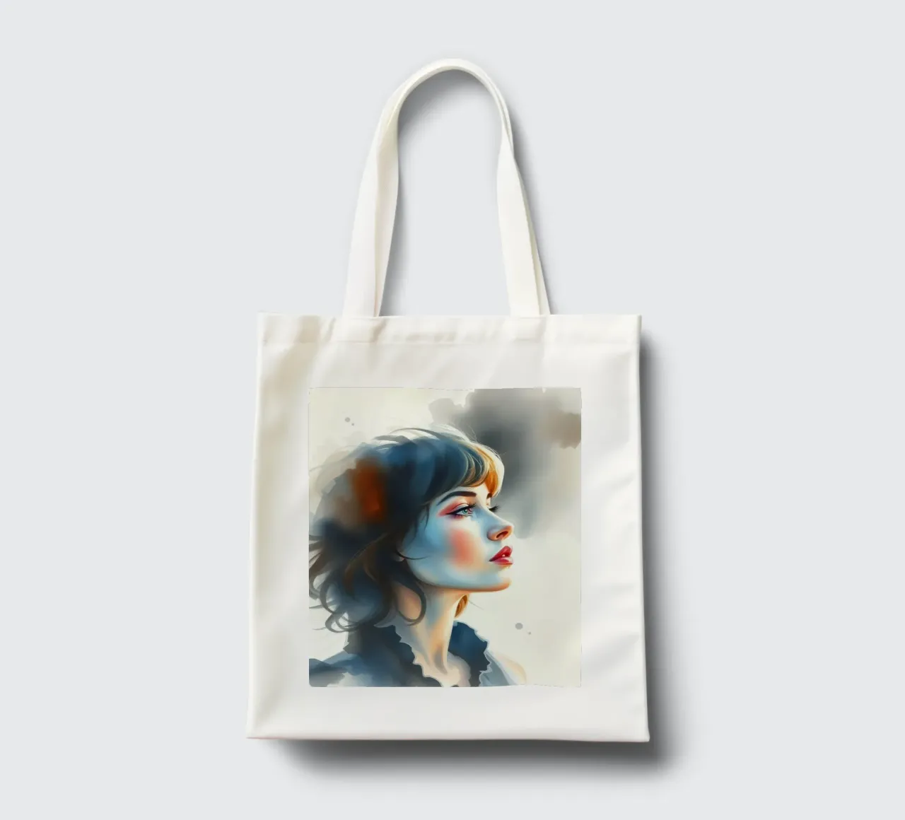 Portrait d'une jeune femme réfléchie avec des cheveux élégants tote bag de DesignDoodle
