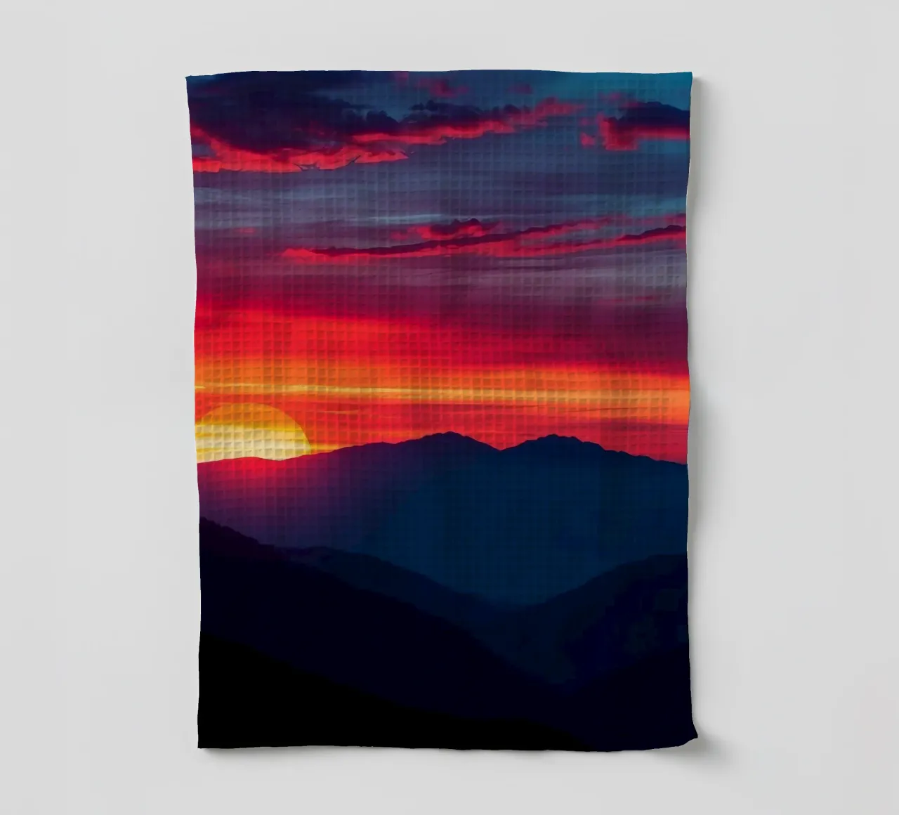 Sunset over mountain range, clouds and tranquil scene tea towel by DesignDoodle