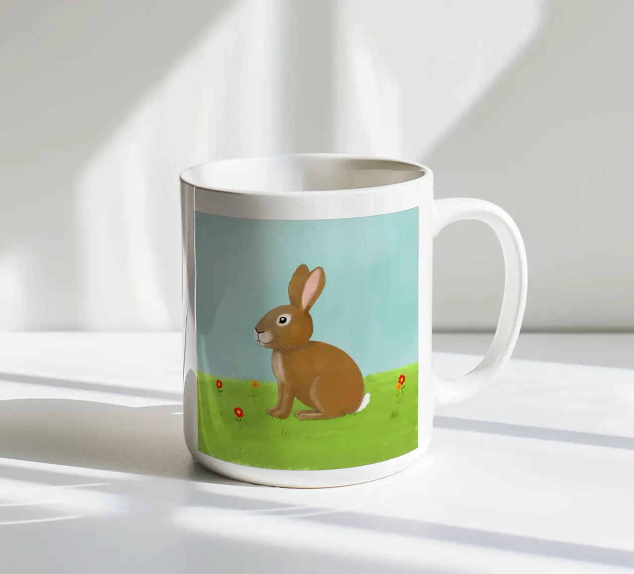 Hase auf Wiese, Kindermotiv tazza in ceramica da Farbwelten