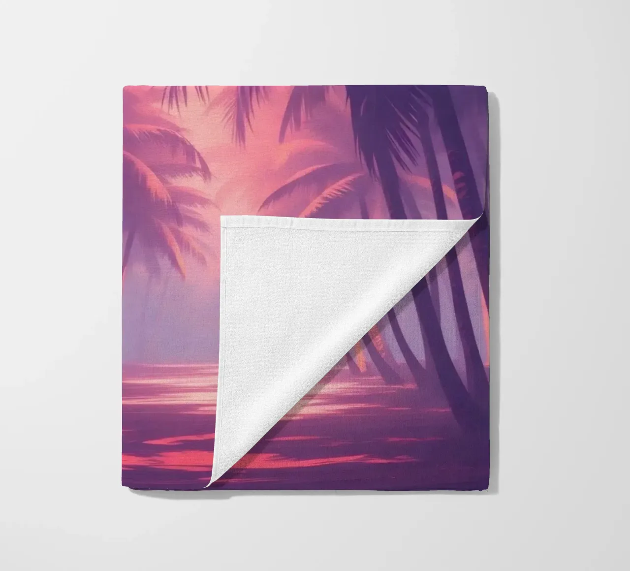 Sunset view of palm trees along serene water at twilight beach towel by DesignDoodle