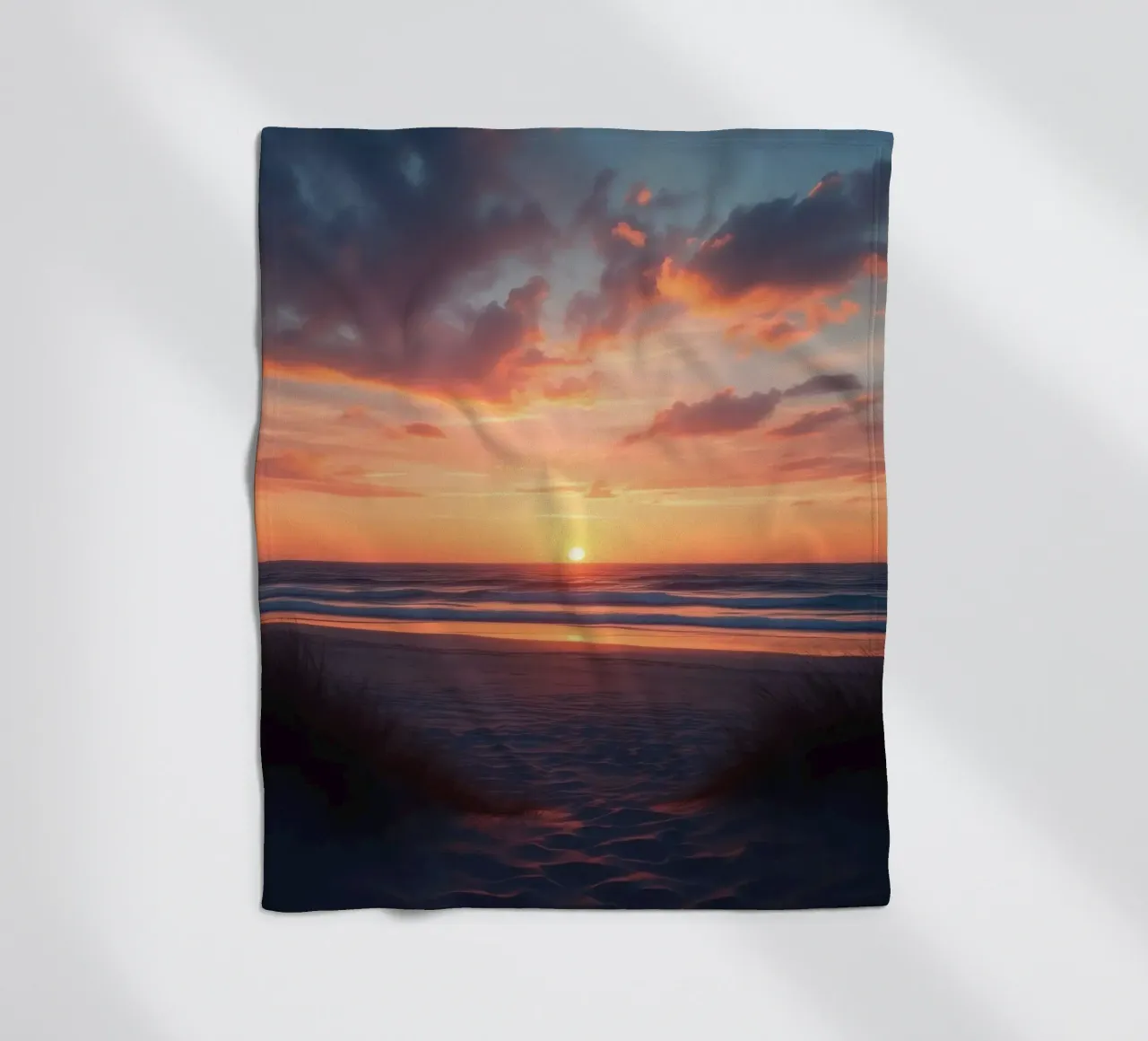 sunset descends over a tranquil beach with gentle waves fleece blanket by DesignDoodle