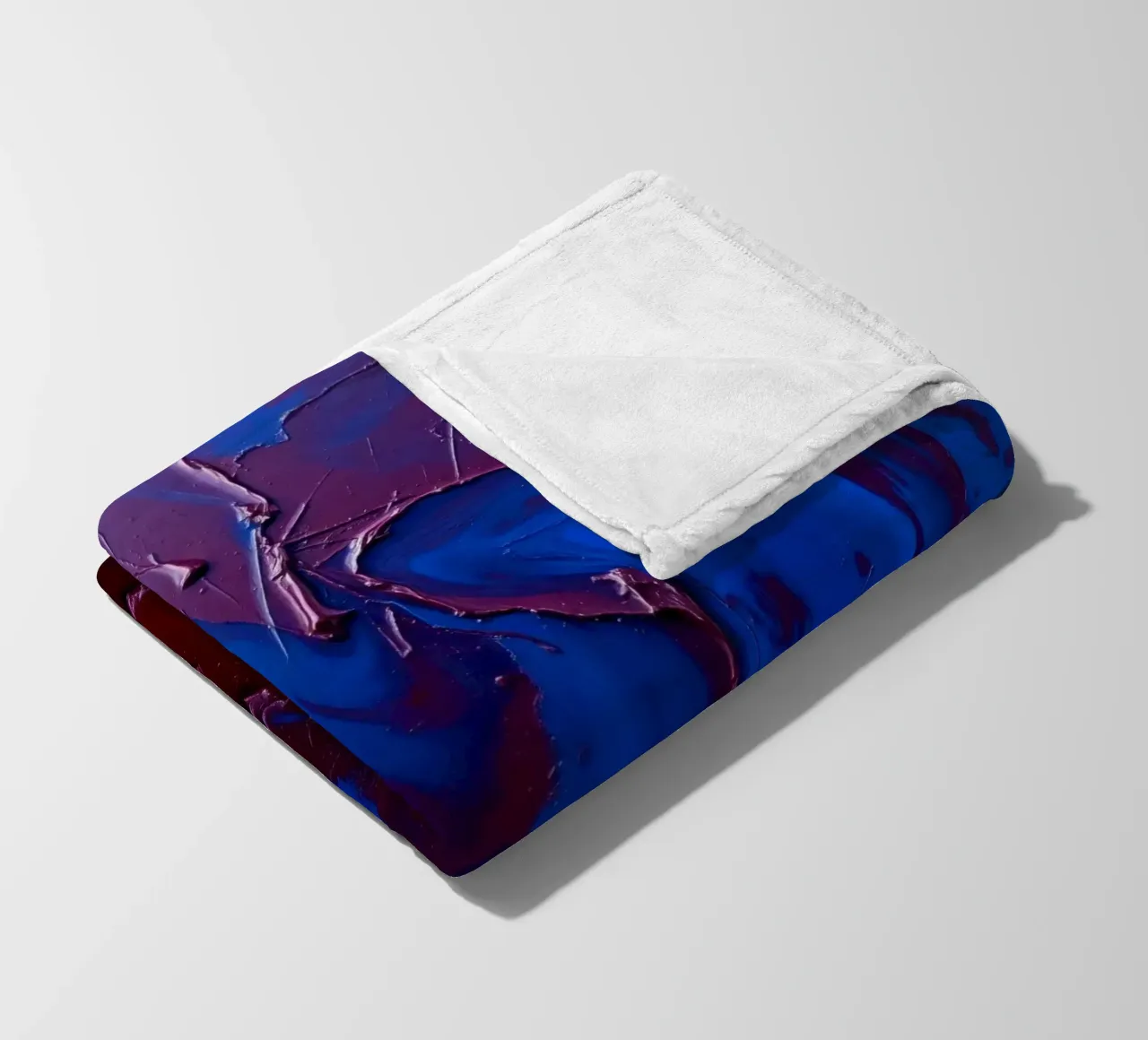 Abstract art piece with textured layers of blue and maroon fleece blanket by DesignDoodle
