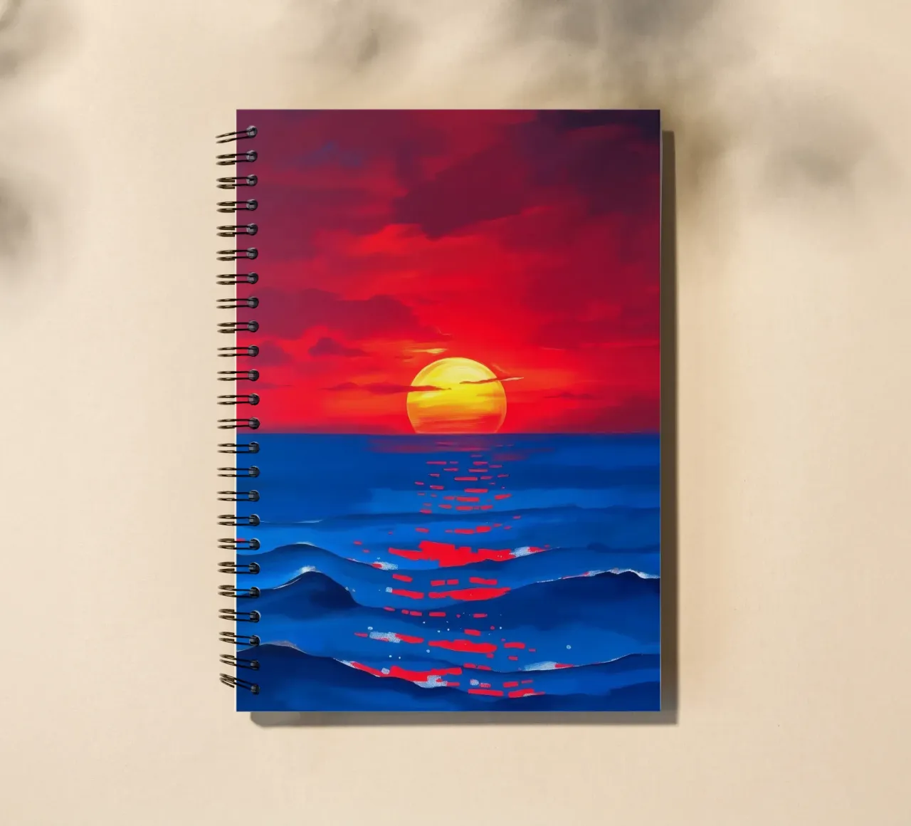 Vibrant sunset over calm ocean waves creating a serene spiral notebook by DesignDoodle