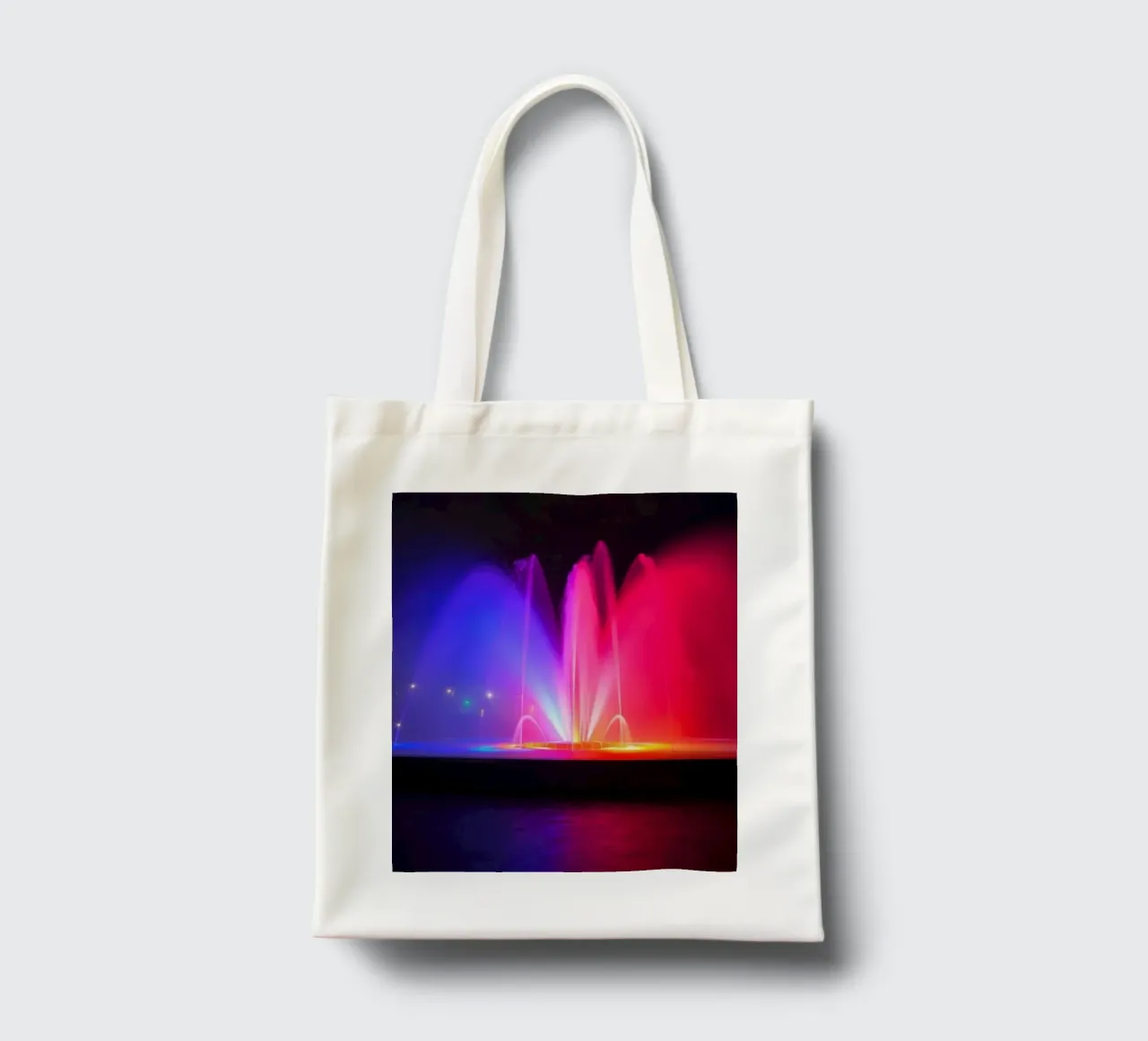 La fontana colorata illumina la notte con una vibrante borsa in juta da DesignDoodle