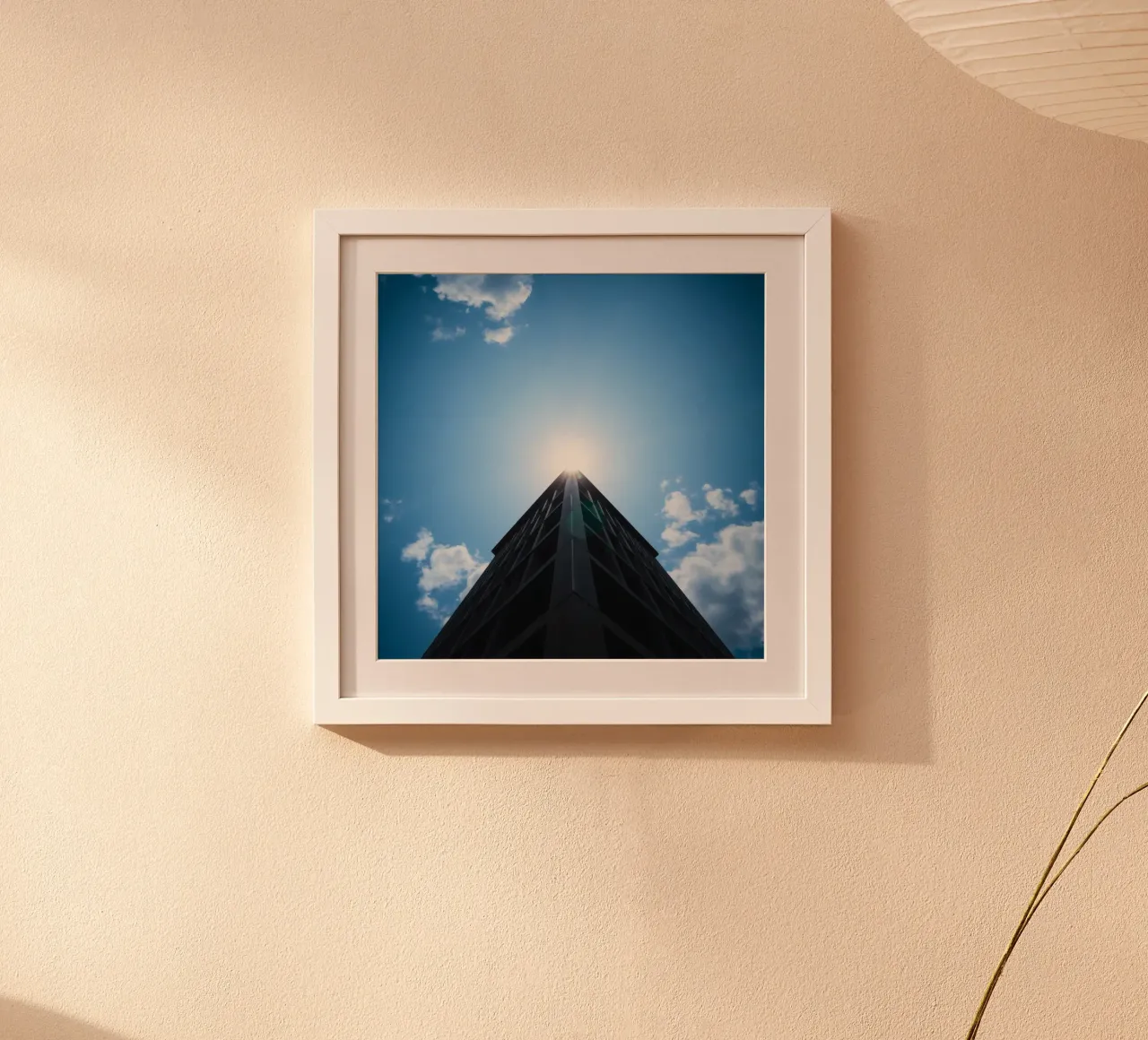 La luce del sole si riflette sulla cima di un alto edificio poster con telaio in plastica da DesignDoodle