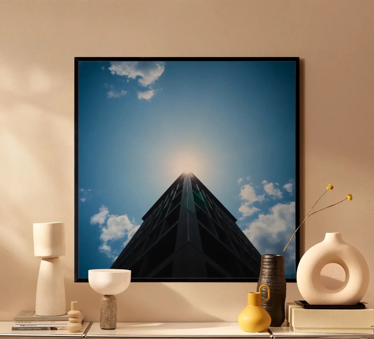 La luce del sole si riflette sulla cima di un alto edificio poster con telaio in plastica da DesignDoodle