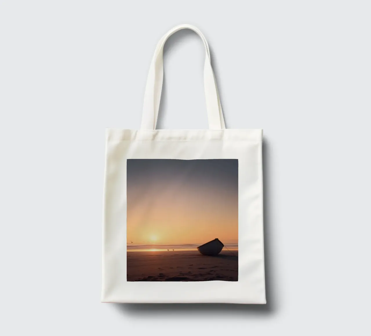 Sunset view with a lone boat on a tranquil beach showcasing tote bag by DesignDoodle